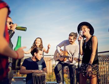 People sip beer while listening to live music 