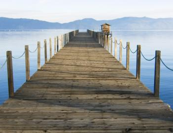 wooden dock with lake tahoe background