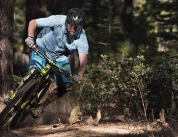 man riding a mountain bike downhill