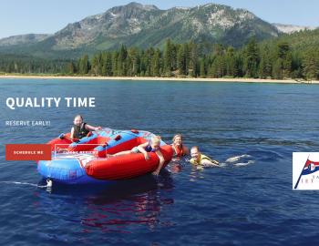 people playing in water with a large inner tube or boat toy