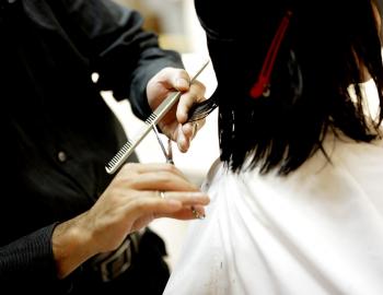 woman getting haircut