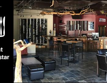 interior of wine bar with tables and chairs