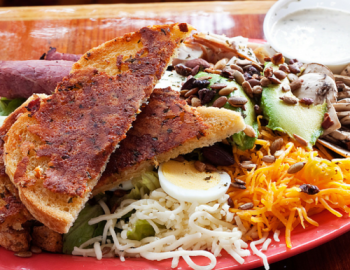 large plate of colorful food and toast