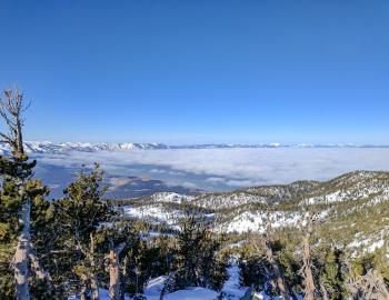 from above the clouds over the lake 