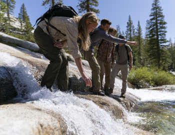 Group of friends exploring Shirley Canyon Falls