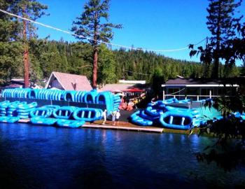 many blue large river rafts