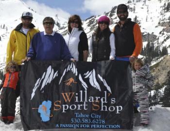 people standing with willard sports logo