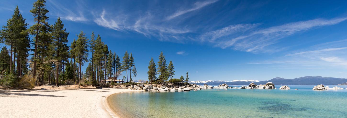 beach view with calm lake 