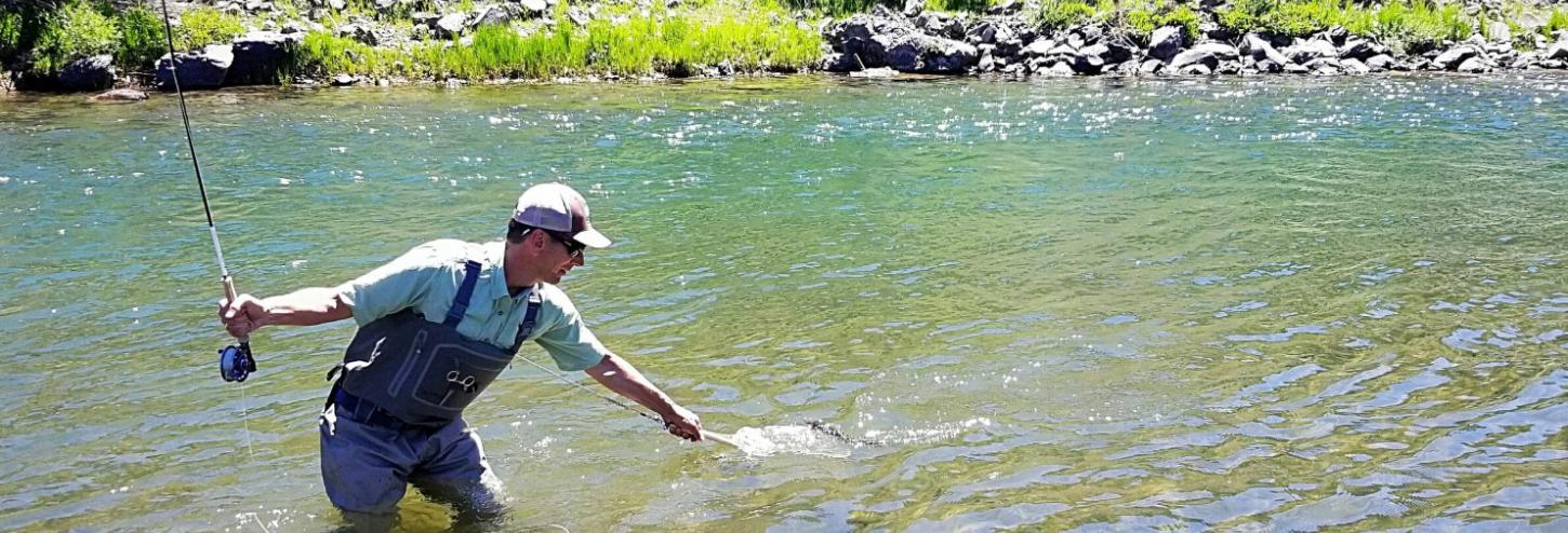 Fly Fishing Truckee River man catching fish