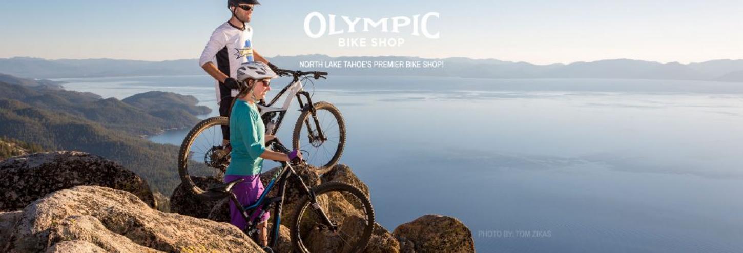 man on a mountain bike overlooking the water