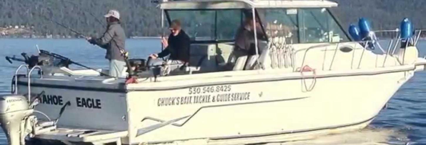 fishing boat with fisherman on it