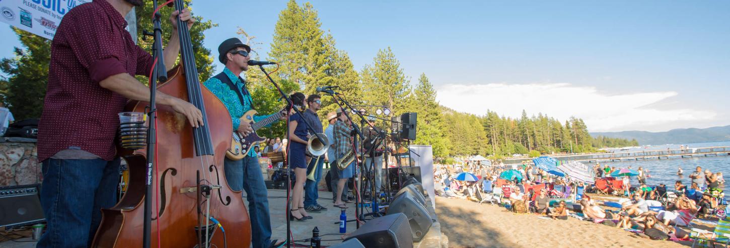 band on the stage at the beach