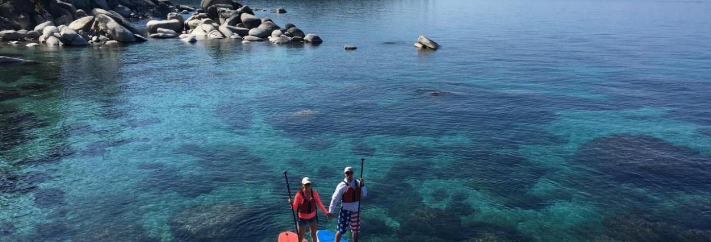 Paddle boards on the shore of lake tahoe