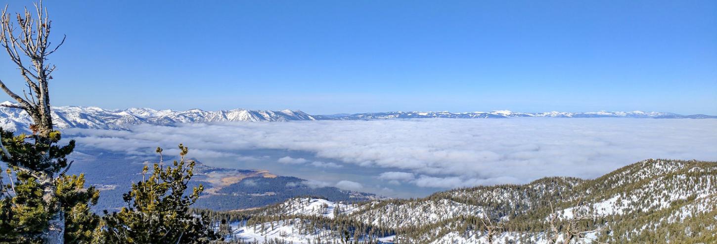 from above the clouds over the lake