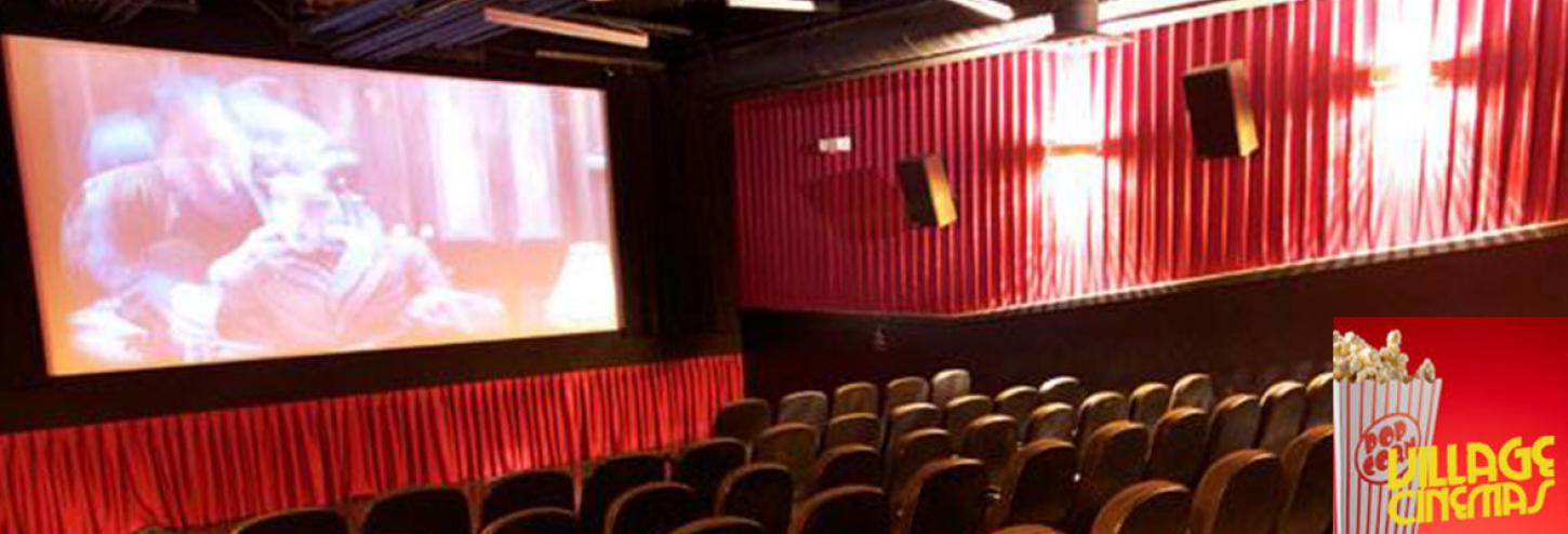 seats and movie screen at theater