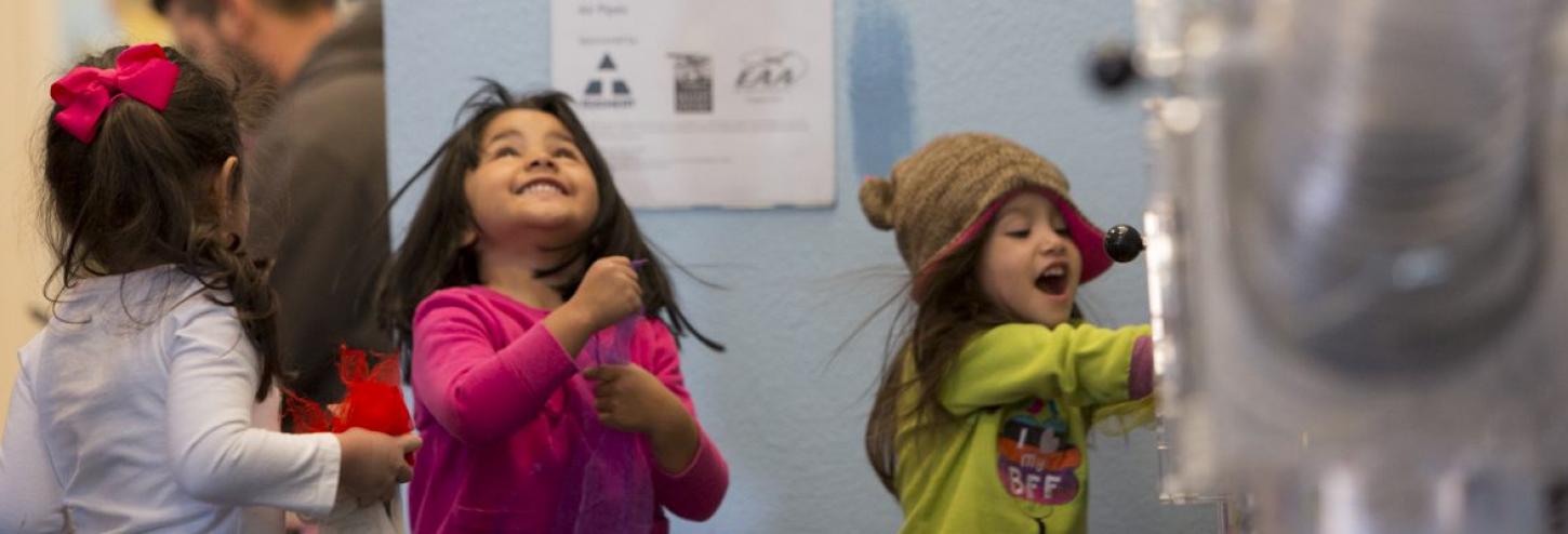 two young girls laughing