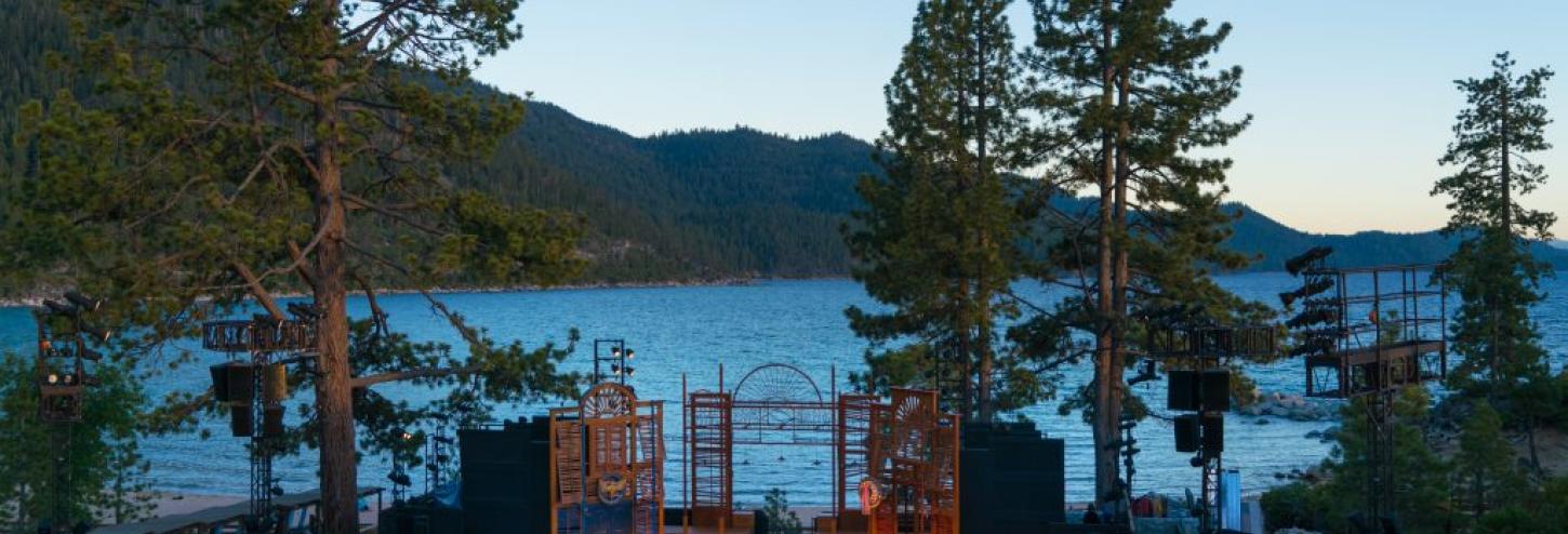 actors stage with waters of tahoe behind