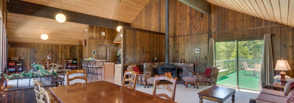 large dining table with a view out the adjacent window