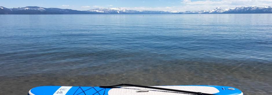 Paddle boards on the shore of lake tahoe