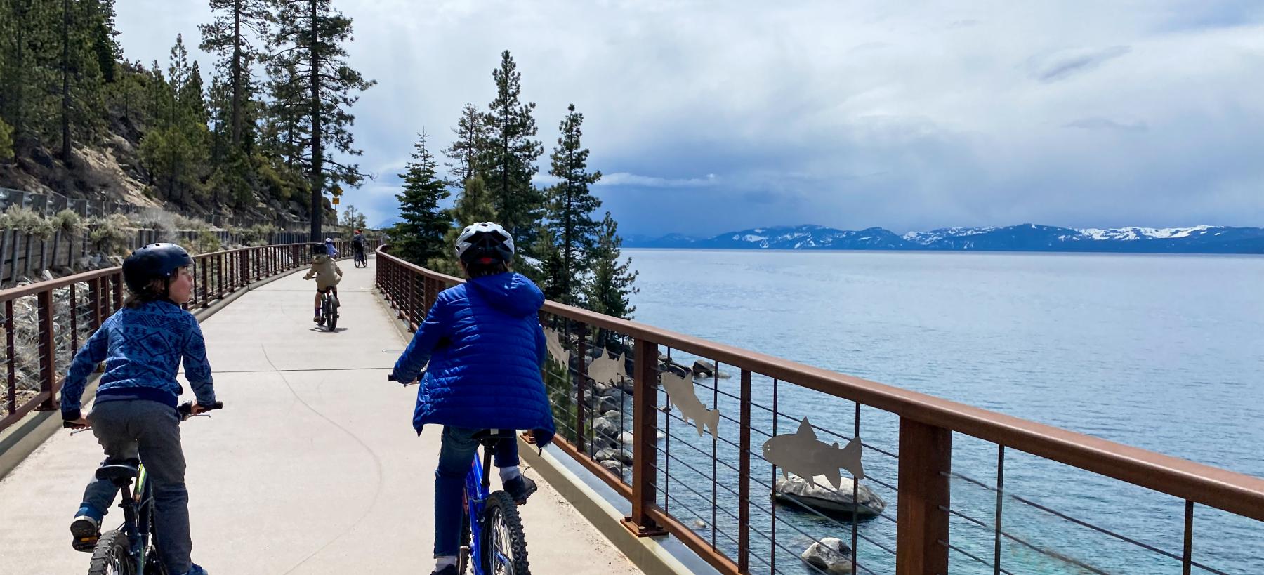 Kids riding bikes along the Lake Tahoe bike path