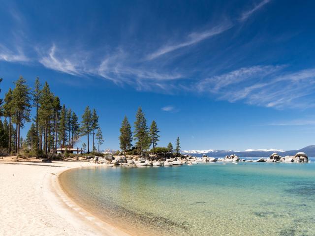 beach view with calm lake 