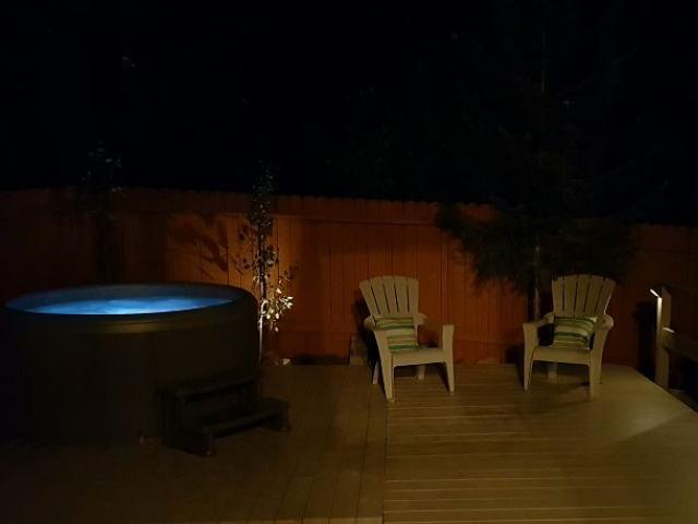 hot tub lit up in the dark