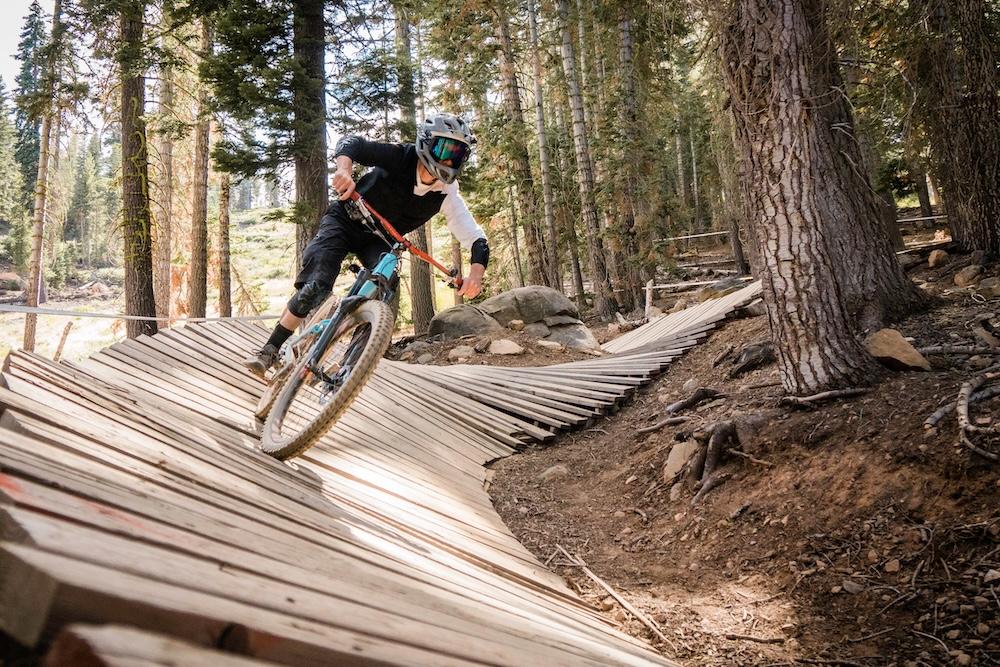mountain biker training on paved trail